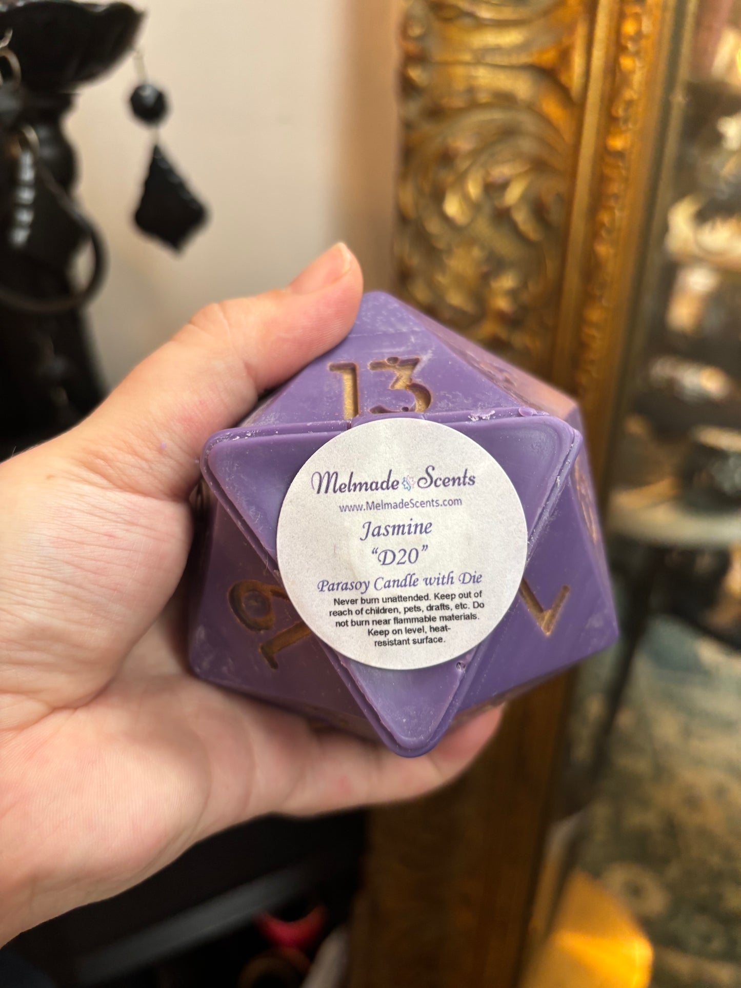 D20 candle with surprise die inside