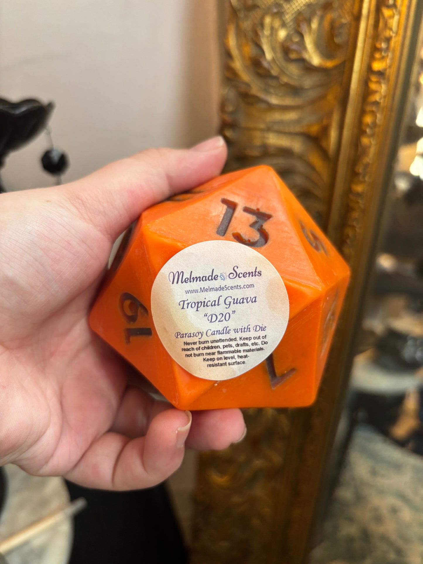 D20 candle with surprise die inside