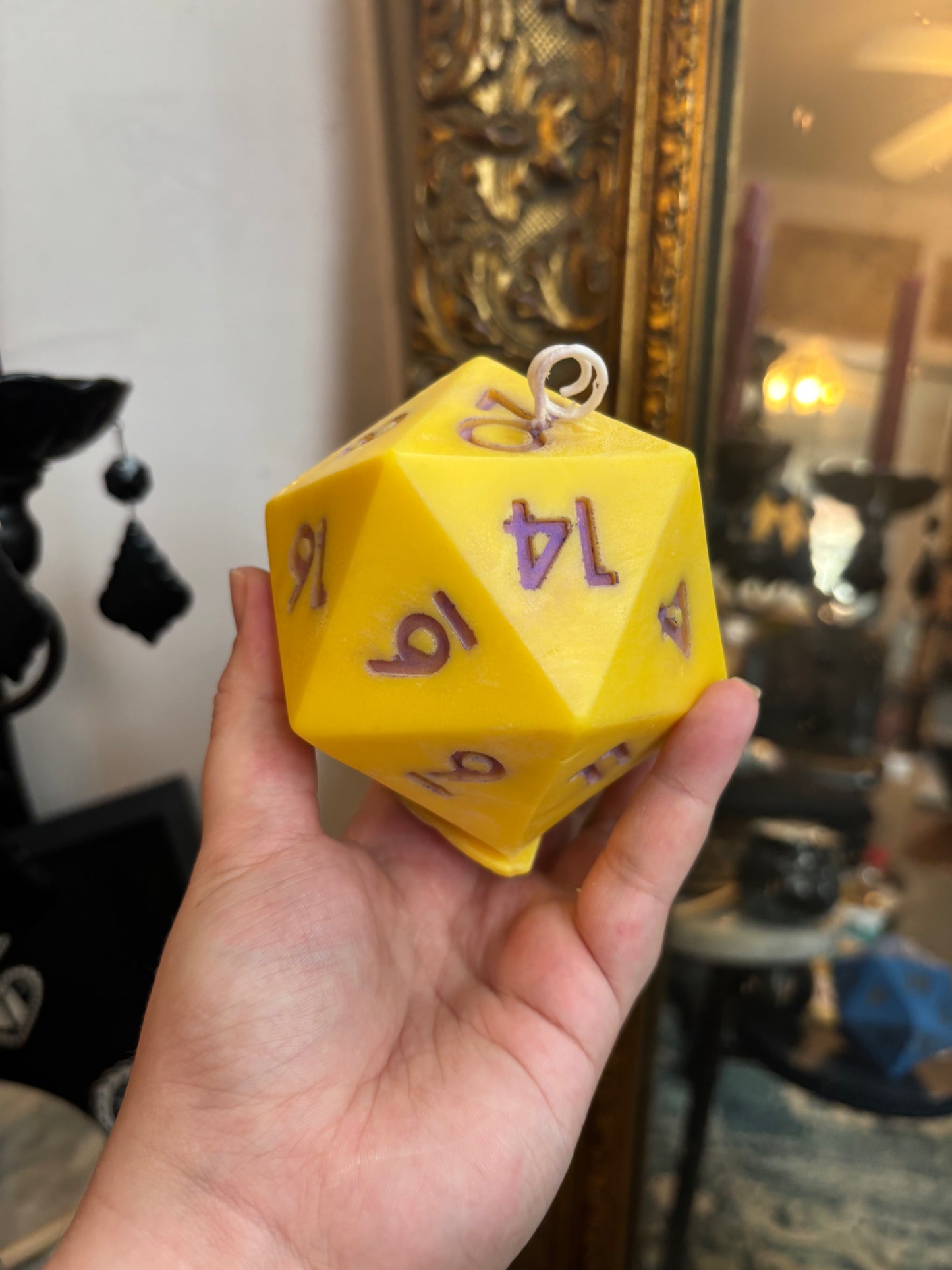 D20 candle with surprise die inside