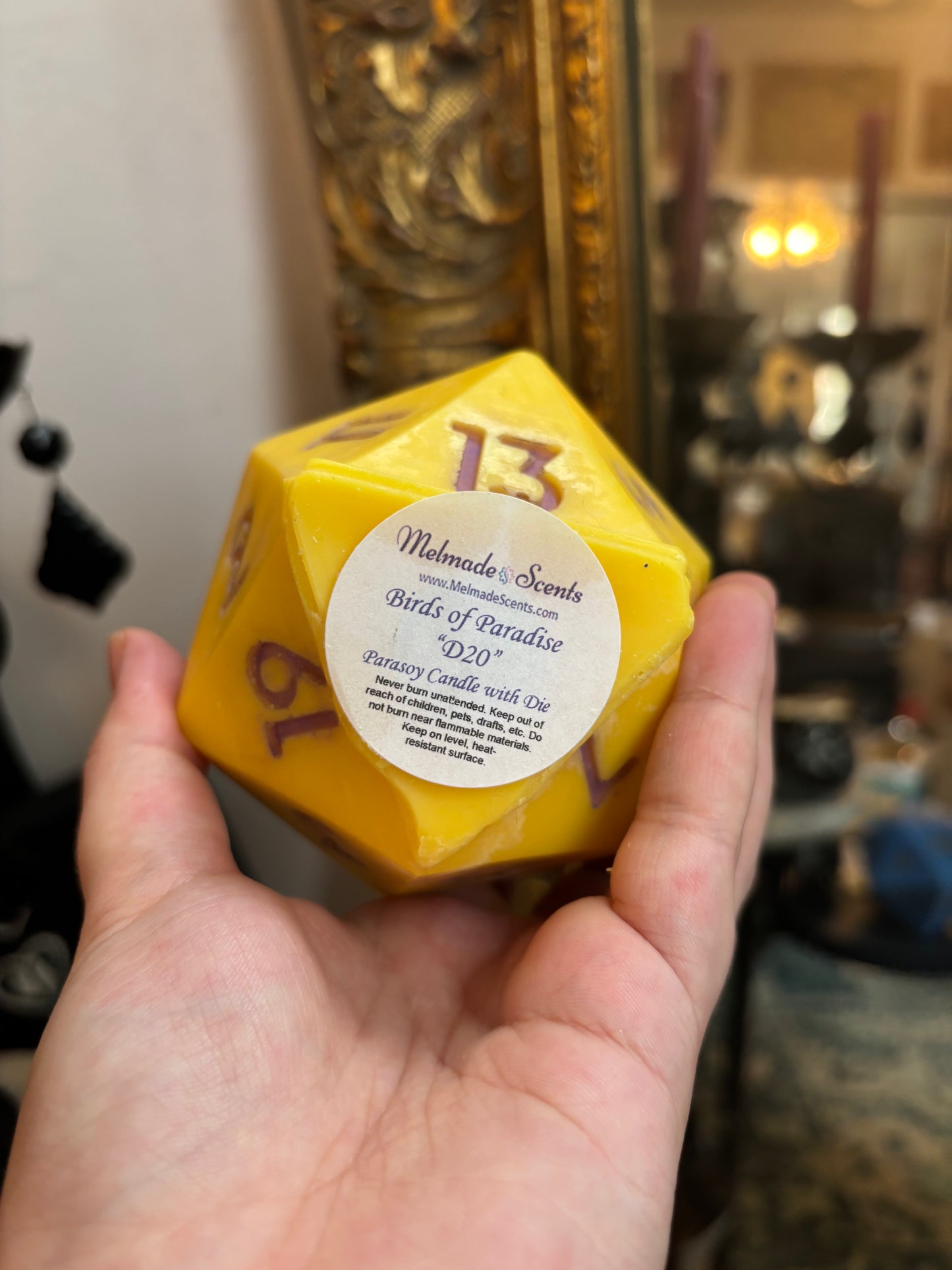 D20 candle with surprise die inside